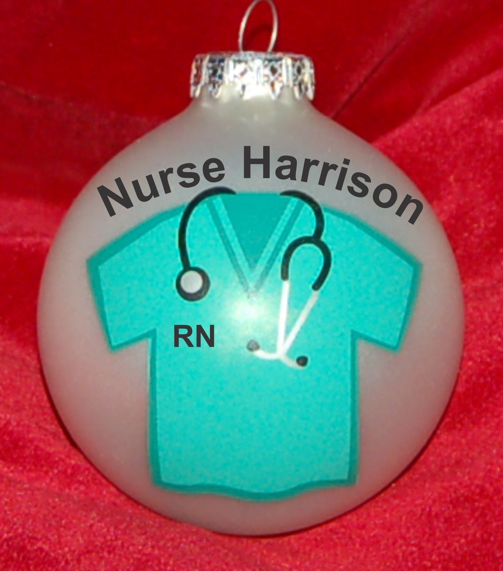 Scrubs for New Nurse Christmas Ornament Personalized FREE at PersonalizedOrnamentsMarket.com by Russell Rhodes