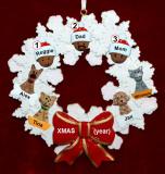 African American Black Family Christmas Ornament for 3 Celebration Wreath Red Bow 4 Dogs, Cats, Pets Custom Add-ons Personalized FREE at PersonalizedOrnamentsMarket.com by Russell Rhodes