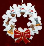 Grandparents Christmas Ornament Celebration Wreath Red Bow 3 Mixed Race Grandkids Personalized FREE at PersonalizedOrnamentsMarket.com by Russell Rhodes