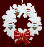 Mixed Race Family of 4 Christmas Ornament Celebration Wreath Red Bow Personalized FREE at PersonalizedOrnamentsMarket.com by Russell Rhodes