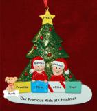 Family Christmas Ornament in Front of Tree Just the 2 Kids with Pets Personalized FREE at PersonalizedOrnamentsMarket.com by Russell Rhodes