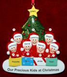 Family Christmas Ornament in Front of Tree Just the 7 Kids Personalized FREE at PersonalizedOrnamentsMarket.com by Russell Rhodes